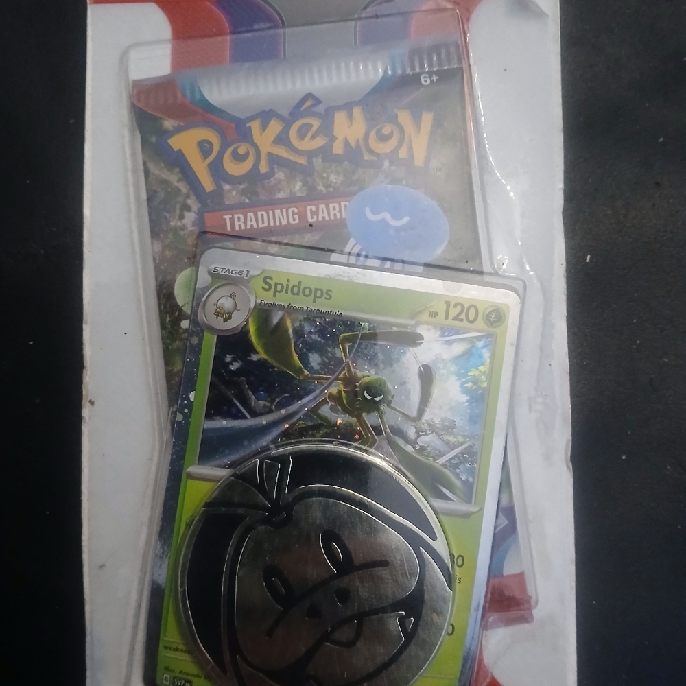 Pokémon Trading Card Pack with Spidops Card and Coin